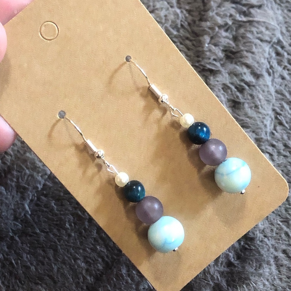 Handcrafted art glass genuine falcons eye elegant dangle earrings